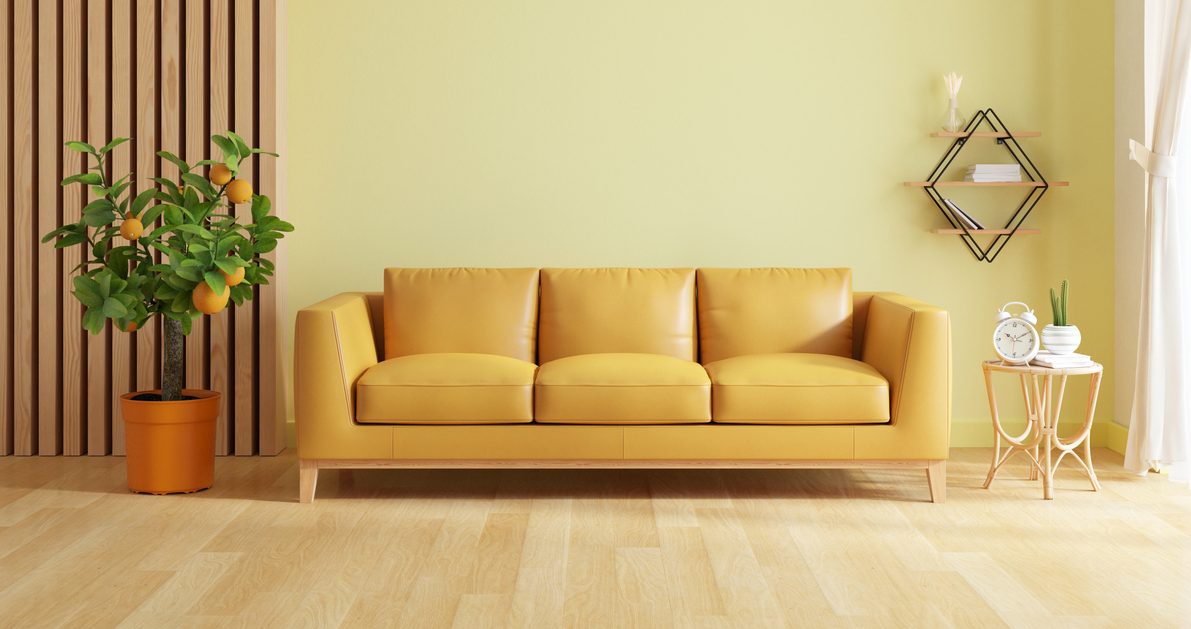Sofa in living room with yellow tones